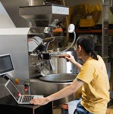 Master coffee roaster at work